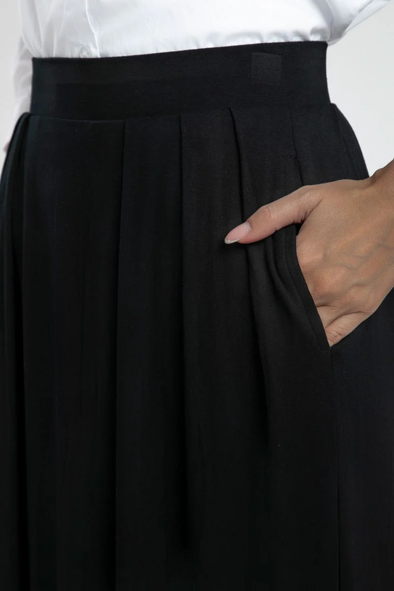 تنورة نسائية ماكسي ضيقة بلون سادة بخصر مطاطي - Image 4
